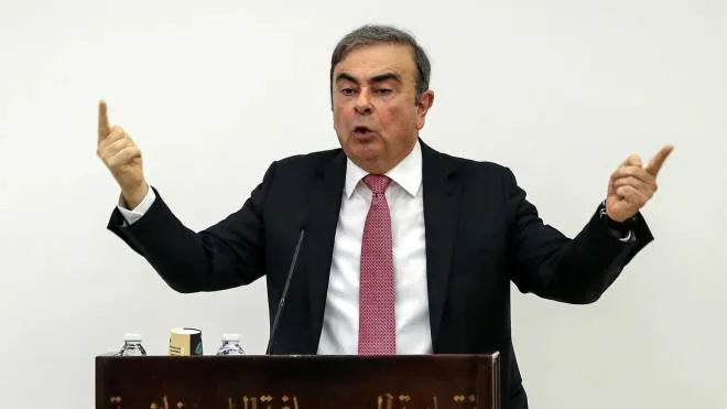 epa08112797 Former Nissan chairman Carlos Ghosn (C) speaks during a press conference in Beirut, Lebanon, 08 January 2020. Ghosn on 08 January defended his innocence in his first public appearance since he escaped from Japan on a private plane on 29 December 2019 where he was on bail and under surveillance in Tokyo awaiting trial on financial misconduct charges.  EPA/NABIL MOUNZER
