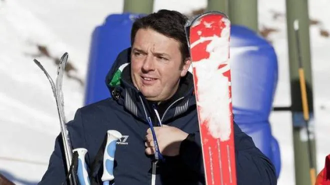Italian Premier Matteo Renzi (R) during his brief skiing vacation in Courmayeur, in the northern region of Valle d'Aosta, Italy, 1 January 2014. ANSA/DI BELLO