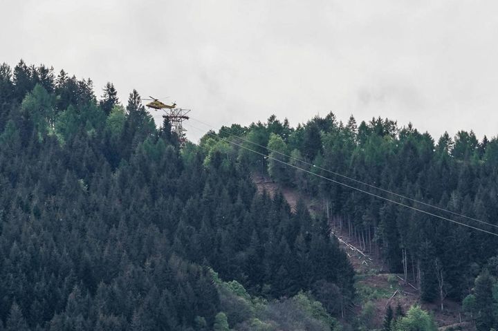 Un elicottero sorvola la zona della tragedia (Ansa)
