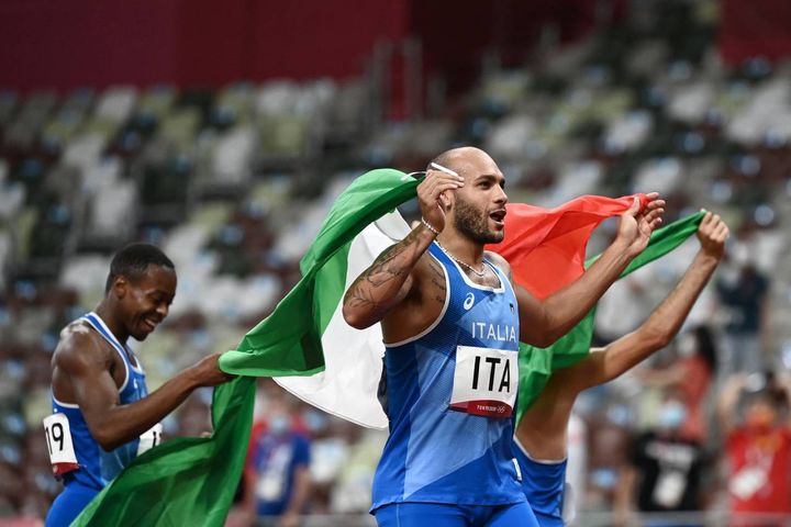 Storico oro dell'Italia nella staffetta 4x100 dei velocisti Lorenzo Patta, Marcell Jacobs, Eseosa Desalu e Filippo Tortu (Afp)